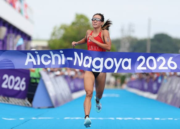 (260920) -- NAGOYA, Sept. 20, 2026 -- Lin Xinyu of China crosses the finish line during the women s individual triathlon final at the 20th Asian Games Aichi-Nagoya 2026 in Gamagori City of Aichi Prefecture, Japan, Sept. 20, 2026. ) (SP)JAPAN-NAGOYA-ASIAN GAMES-TRIATHLON-WOMEN S INDIVIDUAL FINAL DengxHua 