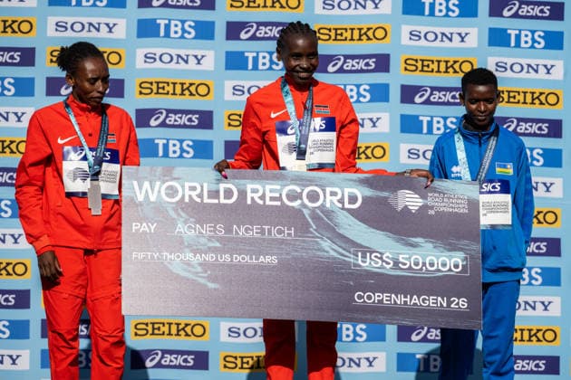 September 20, 2026: Veronica Loleo of Kenya, Agnes Jebet Ngetich of Kenya, and Florence Niyonkuru of Rwanda on the podium after the Copenhagen Half Marathon at the World Athletics Road Running Championships on September 20, 2026 in Copenhagen. Photo by Mathilda Schuler, BILDBYRAN, code MA MA1036. track and field, athletics, friidrett, World Athletics Road Running Championships, Copenhagen Half Marathon 2026, BBENG Half Marathon Copyright: MATHILDAxSCHULER BB260920MA070