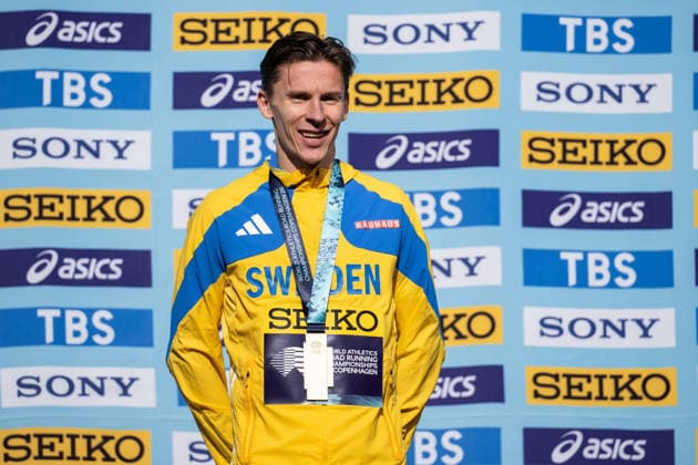 September 20, 2026: Andreas Almgren of Sweden celebrates on the podium after the Copenhagen Half Marathon at the World Athletics Road Running Championships on September 20, 2026 in Copenhagen. Photo by Mathilda Schuler, BILDBYRAN, code MA MA1036. track and field, athletics, friidrett, World Athletics Road Running Championships, Copenhagen Half Marathon 2026, BBENG, half marathon, celebration Copyright: MATHILDAxSCHULER BB260920MA076