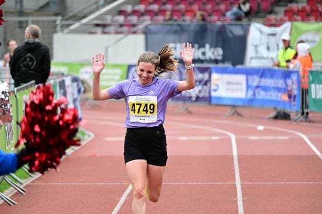 September 20, 2026 xkhx Kassel Kassel Marathon 2026 Half Marathon (Men and Women): Yellow (Half), Red (Marathon), Green (Relay) at the Finish Line: Anna Starostzik