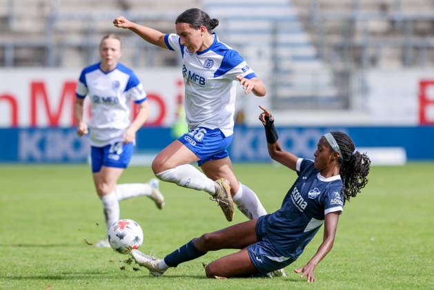 From left: Rahel Lang (SV Meppen), 16, and Chelsea Surpris (SC Sand), 3, in a one-on-one battle, duel, dynamic moment, action, game scene, DFB REGULATIONS PROHIBIT ANY USE OF PHOTOGRAPHS AS SEQUENCE IMAGES AND OR VIDEO-LIKE PHOTO SERIES DFB REGULATIONS PROHIBIT ANY USE OF PHOTOGRAPHS AS IMAGE SEQUENCES AND OR QUASI-VIDEO, September 20, 2026, Meppen, Germany, soccer, Women’s Bundesliga 2, SV Meppen vs. SC Sand xobx