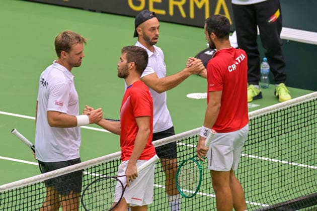 Final scene: Kevin Krawietz (GER) and Tim Pütz (GER) shake hands with Nikola Mektic (CRO) and Mate Pavic (CRO) on September 20, 2026 ¢ Tennis ¢ Davis Cup Qualifiers, 2nd Round ¢ Germany vs. Croatia, Heristo Arena, Halle Westfalen, North Rhine-Westphalia, Germany Copyright: xpepphotox xHorstxMauelshagenx pep00321, pep_20260920_hm
