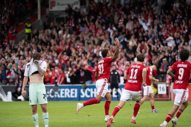 September 20, 2026: Energie Cottbus vs. FC St. Pauli, Matchday 6 of the 2. Bundesliga at the LEAG Energie Stadium—Justin Butler of Energie Cottbus celebrates his goal, making the score 1–0 for Energie Cottbus. IMPORTANT NOTICE: In accordance with the guidelines of the DFL and the DFB, it is prohibited to use or allow the use of photographs taken in the stadium and or during the game in the form of sequential images and or video-like photo sequences Copyright: xJamesxZabelx
