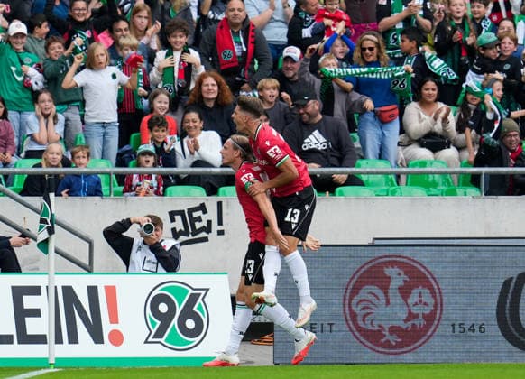 Stefan Teitur Thordarson of Hannover 96, 23, and Franz Roggow of Hannover 96, 13, celebrate after a goal. GER, Hannover 96 vs. VfL Bochum 1848, 2. Bundesliga, Matchday 6, 2026–27 season, Heinz von Heiden Arena, Hannover, September 20, 2026 DFL regulations prohibit any use of photographs as image sequences and or quasi-video Hannover 96 vs. VfL Bochum 1848, 2. Bundesliga, Matchday 6, 2026–27 Season, September 20, 2026, Hannover Copyright: xEibner-Pressefoto ScottxColemanx EP_SCN