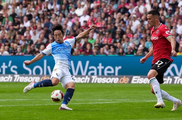 Koji Miyoshi, VfL Bochum 1848, No. 23, shoots the ball; GER, Hannover 96 vs. VfL Bochum 1848, 2. Bundesliga, Matchday 6, 2026–27 season, Heinz von Heiden Arena, Hannover, September 20, 2026 DFL REGULATIONS PROHIBIT ANY USE OF PHOTOGRAPHS AS IMAGE SEQUENCES AND OR QUASI-VIDEO Hannover 96 vs. VfL Bochum 1848, 2. Bundesliga, Matchday 6, 2026–27 Season, September 20, 2026, Hannover Copyright: xEibner-Pressefoto ScottxColemanx EP_SCN