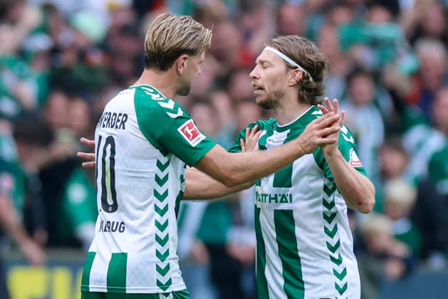 Niclas Fuellkrug of Werder Bremen and Mitchell Weiser of Werder Bremen celebrate during the Bundesliga match between SV Werder Bremen and FC Augsburg at Weserstadion on September 19, 2026, in Bremen, Germany. Photo by Marco Steinbrenner, DeFodi Images. Niclas Fuellkrug of Werder Bremen and Mitchell Weiser of Werder Bremen cheer during the Bundesliga match between SV Werder Bremen and FC Augsburg at Weserstadion on September 19, 2026 in Bremen, Germany. Photo by Marco Steinbrenner, DeFodi Images. DFB and DFL regulations prohibit any use of photographs as image sequences and or quasi-video. Photo by Marco Steinbrenner, DeFodi Images.
