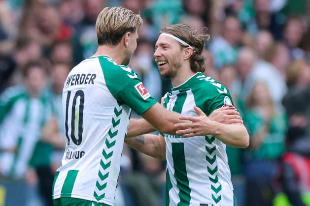 Niclas Fuellkrug of Werder Bremen and Mitchell Weiser of Werder Bremen celebrate during the Bundesliga match between SV Werder Bremen and FC Augsburg at Weserstadion on September 19, 2026, in Bremen, Germany. Photo by Marco Steinbrenner, DeFodi Images. Niclas Fuellkrug of Werder Bremen and Mitchell Weiser of Werder Bremen cheer during the Bundesliga match between SV Werder Bremen and FC Augsburg at Weserstadion on September 19, 2026 in Bremen, Germany. Photo by Marco Steinbrenner, DeFodi Images. DFB and DFL regulations prohibit any use of photographs as image sequences and or quasi-video. Photo by Marco Steinbrenner, DeFodi Images.
