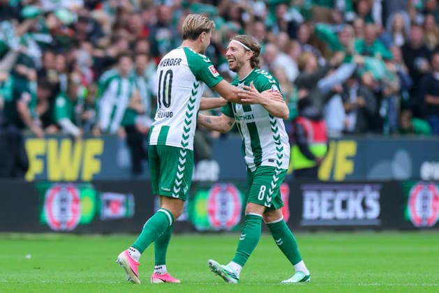 Niclas Fuellkrug of Werder Bremen and Mitchell Weiser of Werder Bremen celebrate during the Bundesliga match between SV Werder Bremen and FC Augsburg at Weserstadion on September 19, 2026, in Bremen, Germany. Photo by Marco Steinbrenner, DeFodi Images. Niclas Fuellkrug of Werder Bremen and Mitchell Weiser of Werder Bremen cheer during the Bundesliga match between SV Werder Bremen and FC Augsburg at Weserstadion on September 19, 2026 in Bremen, Germany. Photo by Marco Steinbrenner, DeFodi Images. DFB and DFL regulations prohibit any use of photographs as image sequences and or quasi-video. Photo by Marco Steinbrenner, DeFodi Images.