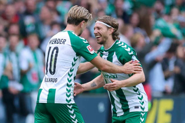 Niclas Fuellkrug of Werder Bremen and Mitchell Weiser of Werder Bremen celebrate during the Bundesliga match between SV Werder Bremen and FC Augsburg at Weserstadion on September 19, 2026, in Bremen, Germany. Photo by Marco Steinbrenner, DeFodi Images. Niclas Fuellkrug of Werder Bremen and Mitchell Weiser of Werder Bremen cheer during the Bundesliga match between SV Werder Bremen and FC Augsburg at Weserstadion on September 19, 2026 in Bremen, Germany. Photo by Marco Steinbrenner, DeFodi Images. DFB and DFL regulations prohibit any use of photographs as image sequences and or quasi-video. Photo by Marco Steinbrenner, DeFodi Images.