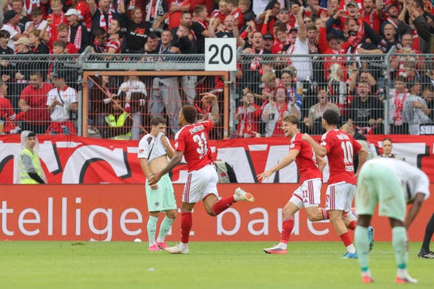 September 20, 2026, xtgx, Soccer 2. Bundesliga, FC Energie Cottbus vs. FC St. Pauli, from left: Justin Butler (Cottbus), 31, celebrating, Goal celebration, celebrating the goal, DFL and DFB regulations prohibit any use of photographs as image sequences and or quasi-video, Cottbus