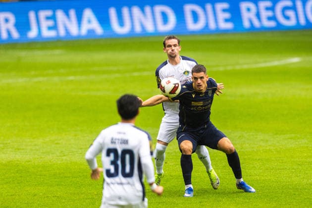 Jena, 200926, Regional Soccer League, FC Carl Zeiss vs. Lok Leipzig; pictured: Timon Burmeister (Jena) vs. Nils Florian Kaiser (Leipzig)