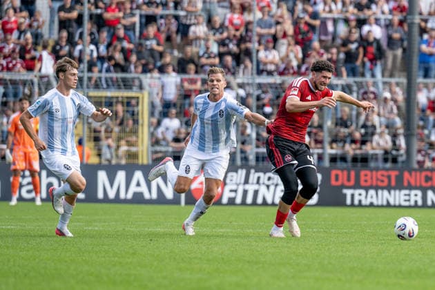 Battle for the Ball: Tackle between Florian Niederlechner (TSV 1860 Munich, No. 07) and Khalid Abu El Haija (1. FC Nuremberg II U23, No. 44), including jersey test GER, TSV 1860 Munich vs. 1. FC Nuremberg II U23, soccer, Bavarian Regional League, Matchday 10, 2026–2027 season, September 20, 2026 DFL DFB regulations prohibit any use of photographs as image sequences and or quasi-video. Photo: HMB Media, Heike Feiner Copyright: HMBxMedia HeikexFeiner