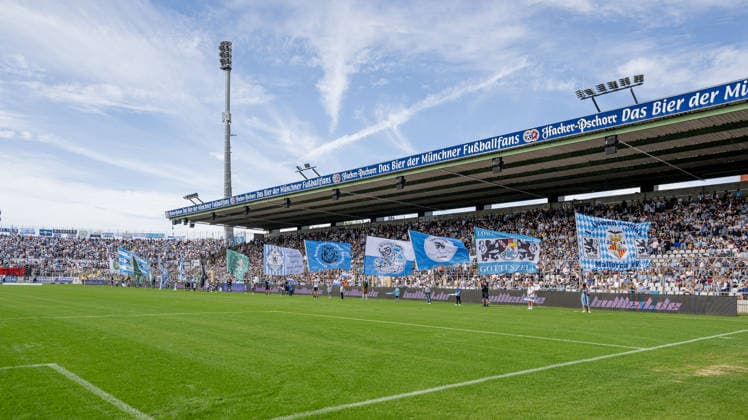The flag-wavers in front of the standing section before kickoff; on the left, the outer sections of the Westkurve GER, TSV 1860 Munich vs. 1. FC Nuremberg II U23, soccer, Bavarian Regional League, Matchday 10, 2026–2027 season, September 20, 2026 DFL DFB regulations prohibit any use of photographs as image sequences and or quasi-video. Photo: HMB Media, Heike Feiner Copyright: HMBxMedia HeikexFeiner