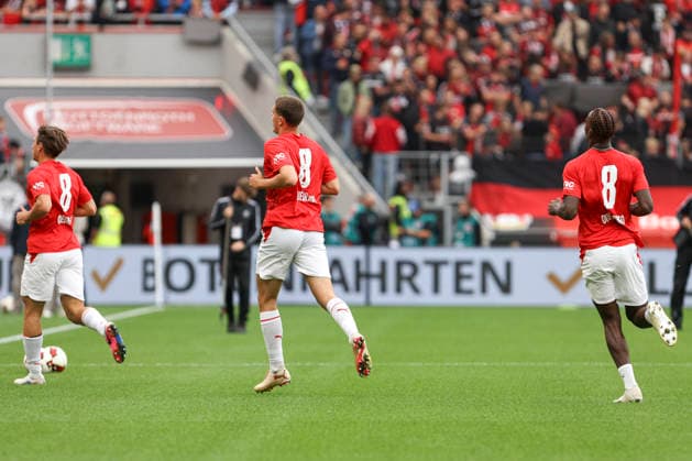 RB Leipzig players wearing the No. 8 jersey of Assan Ouedraogo during the Bundesliga match between Bayer 04 Leverkusen and RB Leipzig, BayArena on September 20, 2026, in Leverkusen, Germany. Photo by Oliver Kaelke, DeFodi Images. Players of RB Leipzig wearing the number 8 jersey (Assan Ouedraogo) during the Bundesliga match between Bayer 04 Leverkusen and RB Leipzig at BayArena on September 20, 2026 in Leverkusen, Germany. Photo by Oliver Kaelke, DeFodi Images. DFB and DFL regulations prohibit any use of photographs as image sequences and or quasi-video. Photo by Oliver Kaelke, DeFodi Images.