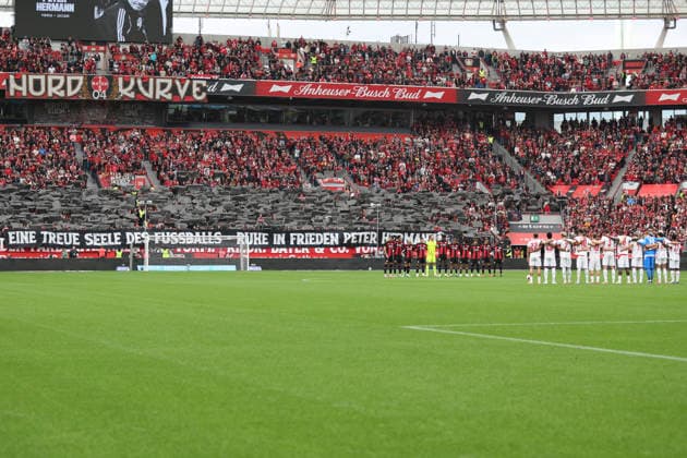 The Bayer 04 Leverkusen and RB Leipzig teams during the minute of silence in honor of Peter Herrmann during the Bundesliga match between Bayer 04 Leverkusen and RB Leipzig at BayArena on September 20, 2026, in Leverkusen, Germany Photo by Oliver Kaelke DeFodi Images Teams from Bayer 04 Leverkusen and RB Leipzig during the minute of silence in honor of Peter Herrmann during the Bundesliga match between Bayer 04 Leverkusen and RB Leipzig at BayArena on September 20, 2026 in Leverkusen, Germany. Photo by Oliver Kaelke, DeFodi Images. DFB and DFL regulations prohibit any use of photographs as image sequences and or quasi-video. Photo by Oliver Kaelke, DeFodi Images.