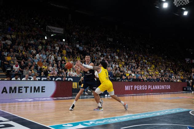 September 20, 2026, GER, Basketball, Bundesliga 1 Matchday, 2026–2027 Season, Oldenburg, EWE Arena, EWE Baskets Oldenburg vs. Syntainics MBC Borisa SIMANIC Syntainics MBC 22 Tylan POPE EWE Baskets Oldenburg 9 Oldenburg EWE Arena Lower Saxony Germany Copyright: xnordphotoxGmbHx xRojahnx