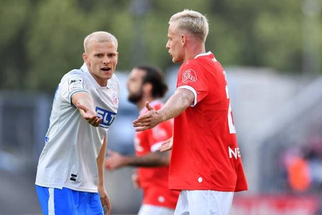 Rot Weiss Essen vs. Hansa Rostock ** FOR EDITORIAL USE ONLY ** EDITORIAL USE ONLY ** p Soccer 3rd Division, Matchday 7: Rot-Weiss Essen vs. Hansa Rostock on September 20, 2026, at the Stadion an der Hafenstrasse in Essen. Milosz Brozowski (Hansa Rostock), on the left, Janne Sietan of Rot-Weiss Essen; on the right, Essen, North Rhine-Westphalia, Germany. Copyright ThorstenxTillmann Copyright: ThorstenxTillmann doc87onv8b1jau1a0rtdom4 ,EDITORIAL USE ONLY Copyright: ThorstenxTillmann