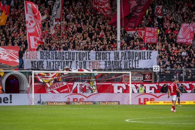 September 20, 2026: Energie Cottbus vs. FC St. Pauli, Matchday 6 of the 2. Bundesliga at the LEAG Energie Stadium Banner: Your rainbow utopia ends in pedophilia. No acceptance for your sick world. IMPORTANT NOTICE: In accordance with DFL and DFB regulations, it is prohibited to use or allow the use of photographs taken in the stadium and or during the game in the form of still images and or video-like photo sequences Copyright: xJamesxZabelx