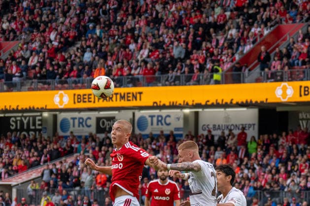 September 20, 2026: Energie Cottbus vs. FC St. Pauli, Matchday 6 of the 2. Bundesliga at the LEAG Energie Stadium. Header by Dmytro Bogdanov of Energie Cottbus, 13 IMPORTANT NOTICE: In accordance with the regulations of the DFL and the DFB, it is prohibited to use or allow the use of photographs taken in the stadium and or during the game in the form of sequential images and or video-like photo sequences. Copyright: xJamesxZabelx