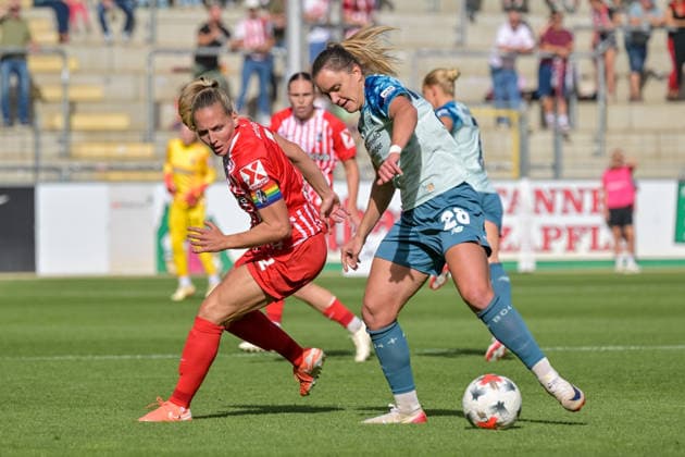 Lisa Karl, SC Freiburg Women, 02; Paulina Tomasiak, Bayer 04 Leverkusen Women, 28, battling for the ball, GER; SC Freiburg vs. Bayer 04 Leverkusen, Women’s Soccer, Bundesliga, Matchday 5, 2026–2027 Season, September 20, 2026 DFB regulations prohibit any use of photographs as image sequences and or quasi-video GER, SC Freiburg vs. Bayer 04 Leverkusen, Women’s Soccer, Bundesliga, Matchday 5, 2026–2027 Season, September 20, 2026, Freiburg Copyright: xEibner-Pressefotox EP_THS