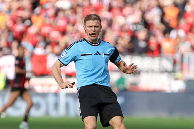 Referee Robert Schroeder gestures during the Bundesliga match between Bayer 04 Leverkusen and RB Leipzig, BayArena on September 20, 2026, in Leverkusen, Germany. Photo by Oliver Kaelke, DeFodi Images. Referee Robert Schroeder gestures during the Bundesliga match between Bayer 04 Leverkusen and RB Leipzig at BayArena on September 20, 2026 in Leverkusen, Germany. Photo by Oliver Kaelke, DeFodi Images. DFB and DFL regulations prohibit any use of photographs as image sequences and or quasi-video. Photo by Oliver Kaelke, DeFodi Images.