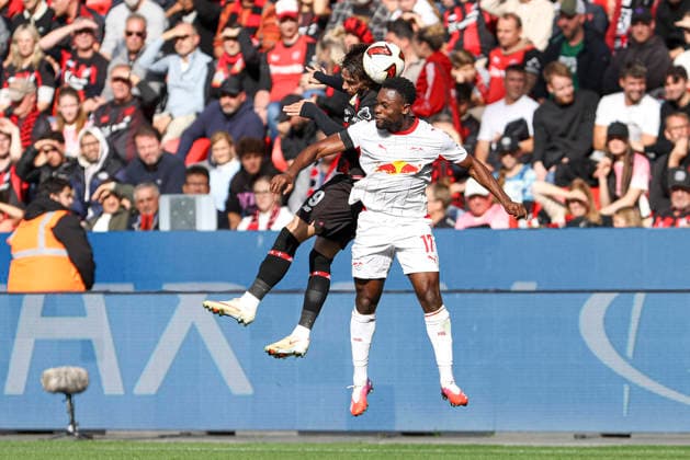 Afonso Moreira of Bayer 04 Leverkusen and Ridle Baku of RB Leipzig battle for the ball during the Bundesliga match between Bayer 04 Leverkusen and RB Leipzig at BayArena on September 20, 2026, in Leverkusen, Germany Photo by Oliver Kaelke DeFodi Images Afonso Moreira of Bayer 04 Leverkusen and Ridle Baku of RB Leipzig battle for the ball during the Bundesliga match between Bayer 04 Leverkusen and RB Leipzig at BayArena on September 20, 2026 in Leverkusen, Germany. Photo by Oliver Kaelke, DeFodi Images. DFB and DFL regulations prohibit any use of photographs as image sequences and or quasi-video. Photo by Oliver Kaelke, DeFodi Images.