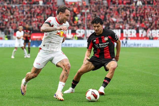 David Raum of RB Leipzig and Ibrahim Maza of Bayer 04 Leverkusen battle for the ball during the Bundesliga match between Bayer 04 Leverkusen and RB Leipzig, BayArena on September 20, 2026, in Leverkusen, Germany. Photo by Oliver Kaelke, DeFodi Images. David Raum of RB Leipzig and Ibrahim Maza of Bayer 04 Leverkusen battle for the ball during the Bundesliga match between Bayer 04 Leverkusen and RB Leipzig at BayArena on September 20, 2026 in Leverkusen, Germany. Photo by Oliver Kaelke, DeFodi Images. DFB and DFL regulations prohibit any use of photographs as image sequences and or quasi-video. Photo by Oliver Kaelke, DeFodi Images.