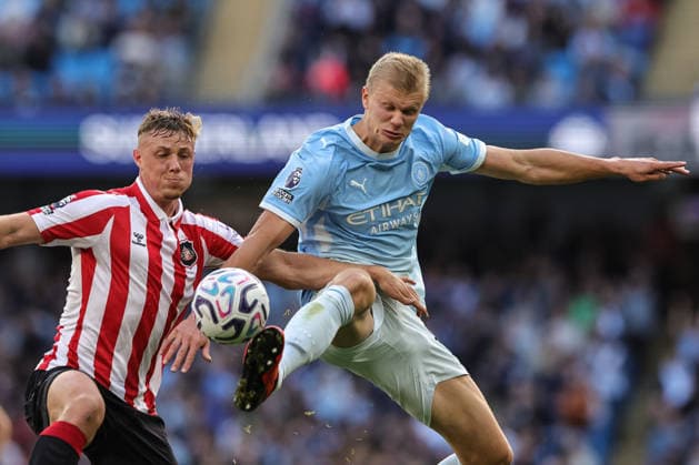 Premier League: Manchester City v Sunderland Erling Haaland of Manchester City holds off Daniel Ballard of Sunderland during the Premier League match Manchester City vs Sunderland at Etihad Stadium, Manchester, United Kingdom on 20 September 2026 (Photo by Mark Cosgrove News Images) Manchester Etihad Stadium Greater Manchester United, ManU Kingdom Copyright: xMarkxCosgrove NewsxImagesx