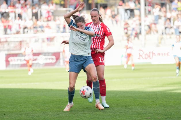Google Pixel Women s Bundesliga: SC Freiburg vs. Bayer 04 Leverkusen, September 20, 2026. A tackle between Lilla Turanyi (Bayer 04 Leverkusen, 24) and Luca Emily Birkholz (SC Freiburg), 23 Google Pixel Women’s Bundesliga SC Freiburg vs. Bayer 04 Leverkusen, Dreisamstadion, September 20, 2026 DFB and DFL regulations prohibit any use of photographs as image sequences and or quasi-video. Copyright: xBEAUTIFULxSPORTS Boscox