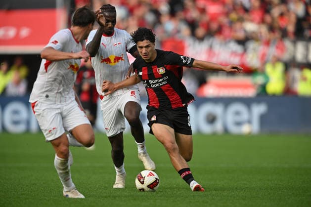 l r Willi Orban, RB Leipzig; Ezechiel Banzuzi, RB Leipzig; Ibrahim Maza, Bayer Leverkusen; Action, Tackle, Soccer, Bundesliga 1, Matchday 4, Bayer 04 Leverkusen vs. RB Leipzig, on September 20, 2026, in Leverkusen, Germany. DFL regulations prohibit any use of photographs as image sequences and or quasi-video.