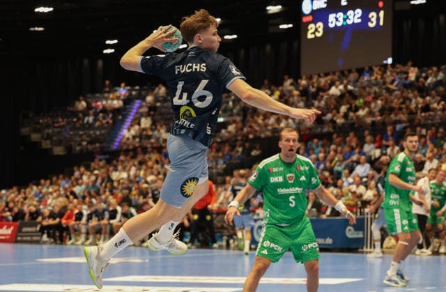 Julian Fuchs (Bergischer HC 46) taking a shot with Max Darj (Füchse Berlin 05) in the background, GER, Bergischer HC vs. Füchse Berlin, Handball, Opel Handball Bundesliga, Matchday 5, 2026–2027 season, September 20, 2026 GER, Bergischer HC vs. Füchse Berlin, Handball, Opel Handball Bundesliga, Matchday 5, 2026–2027 season, September 20, 2026 Düsseldorf Copyright: xEibner-Pressefoto ThomasxStoeckex EP_TSR