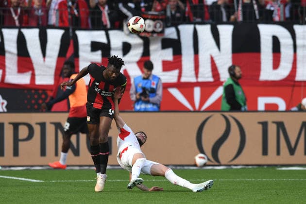 Edmond Tapsoba, Bayer 04 Leverkusen, No. 12, in a tackle with Romulo Cardoso, RB Leipzig No. 40, GER; Bayer 04 Leverkusen vs. RB Leipzig, Soccer, Bundesliga, Matchday 4, 2026–2027 season, September 20, 2026 DFL regulations prohibit any use of photographs as image sequences and or quasi-video GER, Bayer 04 Leverkusen vs. RB Leipzig, Soccer, Bundesliga, Matchday 4, 2026–2027 season, September 20, 2026, Leverkusen Copyright: xEibner-Pressefoto ThomasxThienelx EP_TTL