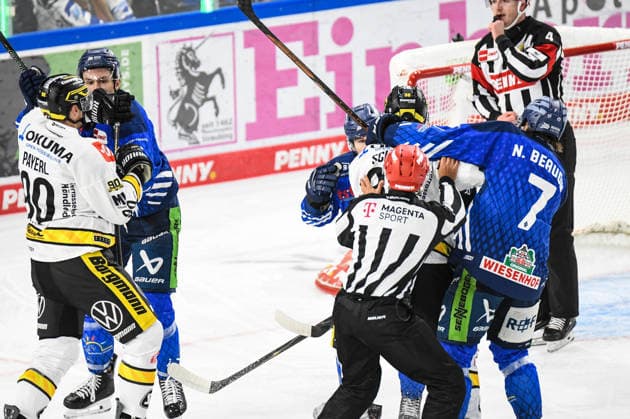 Straubing Tigers vs. Krefeld Pinguine, Ice Hockey, German Ice Hockey League, Penny DEL, Matchday 1, 2026–2027 Season, September 23, 2026: Alex Green, Simon Seidl, and Nicolas Beaudin of the Straubing Tigers in a scuffle with Adam Payerl and Tim Schuetz of the Krefeld Pinguine, Men’s Ice Hockey, German Ice Hockey League, Penny DEL, Matchday 1, 2026–2027 season on September 20, 2026, at the Eisstadion am Pulverturm, Straubing Tigers (blue) vs. Krefeld Pinguine (white)