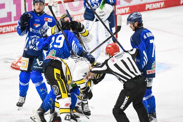 Straubing Tigers vs. Krefeld Pinguine, Ice Hockey, German Ice Hockey League, Penny DEL, Matchday 1, 2026–2027 Season, September 23, 2026: Alex Green, Simon Seidl, and Nicolas Beaudin of the Straubing Tigers in a scuffle with Adam Payerl and Tim Schuetz of the Krefeld Pinguine, Men’s Ice Hockey, German Ice Hockey League, Penny DEL, Matchday 1, 2026–2027 season on September 20, 2026, at the Eisstadion am Pulverturm, Straubing Tigers (blue) vs. Krefeld Pinguine (white)