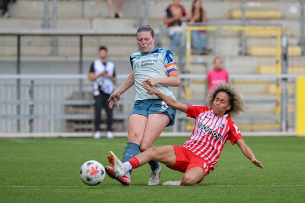 Claudia Wenger, Bayer 04 Leverkusen Women, 05, Amira Arfaoui, SC Freiburg Women, 17, in a duel and sliding tackle, GER, SC Freiburg vs. Bayer 04 Leverkusen, Women’s Soccer, Bundesliga, Matchday 5, 2026–2027 Season, September 20, 2026 DFB regulations prohibit any use of photographs as image sequences and or quasi-video GER, SC Freiburg vs. Bayer 04 Leverkusen, Women’s Soccer, Bundesliga, Matchday 5, 2026–2027 Season, September 20, 2026, Freiburg Copyright: xEibner-Pressefotox EP_THS