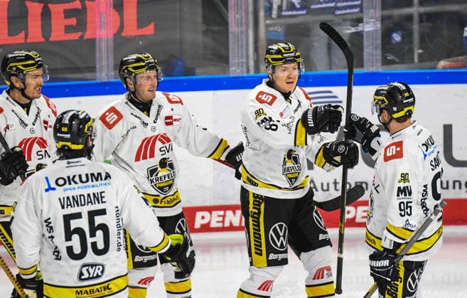 Straubing Tigers vs. Krefeld Pinguine, Ice Hockey, German Ice Hockey League, Penny DEL, Matchday 1, 2026–2027 Season, September 23, 2026 Philip Gogulla, Mathew Santos, Davis Vandane, and Max Newton of the Krefeld Pinguine celebrate, Men’s Ice Hockey, German Ice Hockey League, Penny DEL, Matchday 1, 2026–2027 season on September 20, 2026, at the Eisstadion am Pulverturm; Straubing Tigers (blue) vs. Krefeld Pinguine (white)