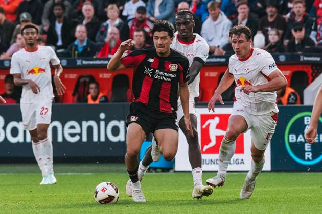 September 20, 2026, xjmrgnx, Soccer, Bundesliga 1, Bayer 04 Leverkusen vs. RB Leipzig: A tackle between Ibrahim Maza (30), Leverkusen, and Ezechiel Banzuzi (6), Leipzig, and Willi Orban 4, Leipzig. DFL and DFB regulations prohibit any use of photographs as image sequences and or quasi-video. Leverkusen
