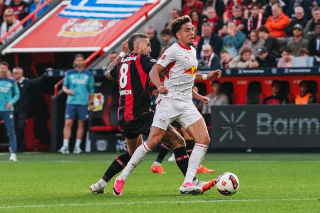 September 20, 2026, xjmrgnx, Soccer, Bundesliga 1, Bayer 04 Leverkusen vs. RB Leipzig: A tackle between Robert Andrich (8), Leverkusen, and Neil El Aynaoui (21), Leipzig. DFL and DFB regulations prohibit any use of photographs as image sequences and or quasi-video. Leverkusen