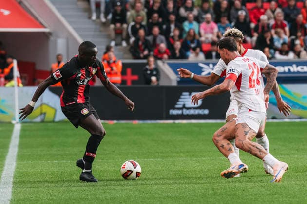 September 20, 2026, xjmrgnx, Soccer, Bundesliga 1, Bayer 04 Leverkusen vs. RB Leipzig: A tackle between Moussa Diaby (19), Leverkusen, and Antonio Nusa (7), Leipzig, and David Raum 22, Leipzig. DFL and DFB regulations prohibit any use of photographs as image sequences and or quasi-video. Leverkusen