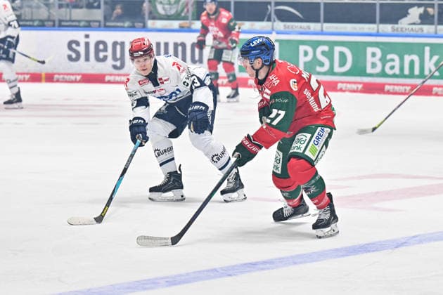 Penny DEL, Augsburger Panther vs. Schwenninger Wild Wings, September 20, 2026, AUGSBURG, GERMANY, September 20: Reed LEBSTER of the Schwenninger Wild Wings (No. 23) and Kyle MAYHEW of the Augsburger Panther (No. 27) face off during the Penny DEL match between the Augsburger Panther and the Schwenninger Wild Wings on Matchday 2 at Curt Frenzel Stadium Copyright: xBEAUTIFULxSPORTS Goldbergx