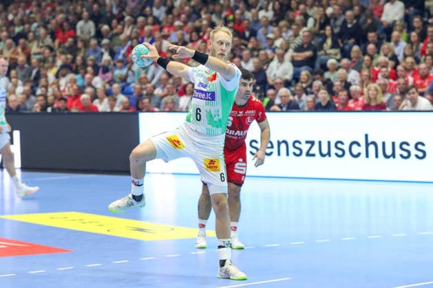 September 20, 2026, xgox, Handball: Opel HBL MT Melsungen vs. SC Magdeburg emspor, from left: Matthias Musche (Magdeburg), 6 on a penalty throw for Kassel