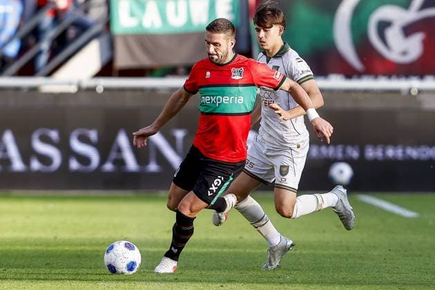 NIJMEGEN , 20-09-2026 , Stadium De Goffert , season 2026 2027 , Dutch Eredivisie football . match between NEC Nijmegen and Go Ahead Eagles, Final result 1-1, Picture shows NEC Nijmegen player Dusan Tadic GA Eagles player Tomas Galvez NEC - Go Ahead Eagles  x207331458x Copyright: