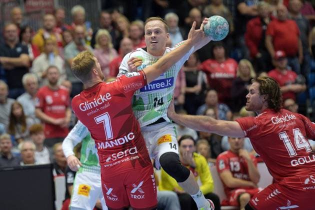 Omar Ingi Magnusson, SC Magdeburg 14, on a shot; Emre Boeyuekata, KSV Hessen Kassel 7; Johannes Golla, MT Melsungen 14 R, GER, MT Melsungen vs. SC Magdeburg, Handball, 1st Bundesliga, Matchday 5, 2026–2027 season, September 20, 2026, GER, MT Melsungen vs. SC Magdeburg, Handball, 1st Bundesliga, Matchday 5, 2026–2027 season, September 20, 2026, Kassel Copyright: xEibner-Pressefotox xRolandxSippelx EP_RSL