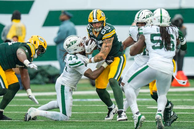 Sep 20, 2026; East Rutherford, NJ, USA; Green Bay Packers tight end Tucker Kraft (85) with the catch as New York Jets linebacker Jamien Sherwood (44) tries to bring him down during an NFL, American Football Herren, USA game at MetLife Stadium. Mandatory Credit: -Cal Media East Rutherford USA - ZUMAc04_ 20260920_zma_c04_056 Copyright: xChrisxSzagolax