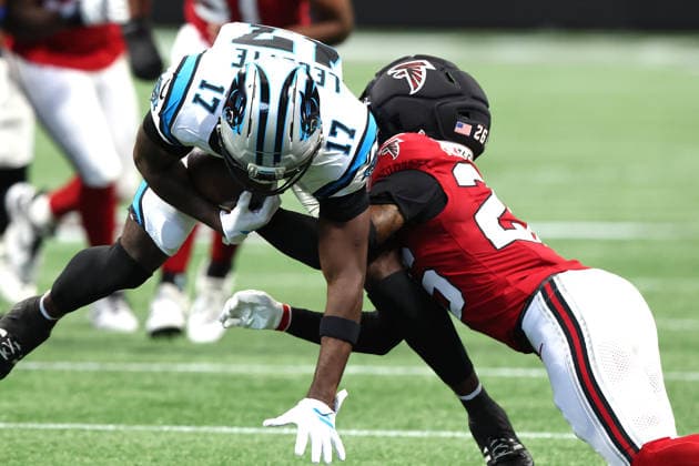 ATLANTA, GA - SEPTEMBER 20: C.J. Henderson (26) of the Atlanta Falcons tackles Xavier Legette (17) of the Carolina Panthers during the Sunday afternoon NFL, American Football Herren, USA game between the Atlanta Falcons and the Carolina Panthers on September 20, 2026 at the Mercedes-Benz Stadium in Atlanta, Georgia. (Photo by David J. Griffin Icon Sportswire) NFL: SEP 20 Panthers at Falcons EDITORIAL USE ONLY Icon9532609200418