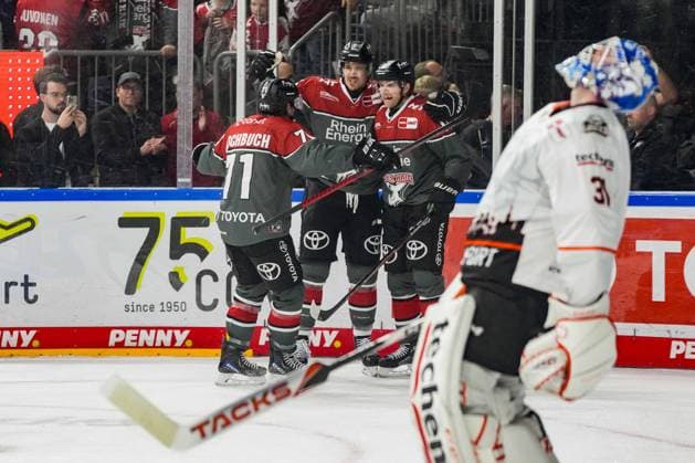 Ice Hockey: Penny DEL, Matchday 2—Cologne Sharks vs. Frankfurt Lions on September 20, 2026, at the Lanxess Arena in Cologne. Valtteri Kemiläinen of Cologne, in the right corner, celebrates his game-winning goal to make it 4–3 in overtime. According to the guidelines of the DEL (German Ice Hockey League), the publication and further use of the footage in electronic media and on devices of any kind during the game is not permitted. xDMx