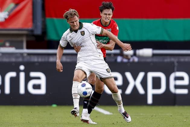 NIJMEGEN , 20-09-2026 , Stadium De Goffert , season 2026 2027 , Dutch Eredivisie football . match between NEC Nijmegen and Go Ahead Eagles, Final result 1-1, Picture shows GA Eagles player Melle Meulensteen NEC Nijmegen player Tobias Storm NEC - Go Ahead Eagles  x207340467x Copyright: