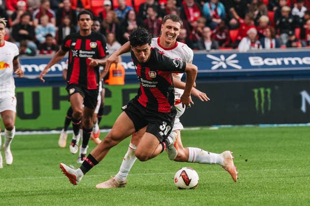 September 20, 2026, xjmrgnx, Soccer, Bundesliga 1, Bayer 04 Leverkusen vs. RB Leipzig, a tackle between Ibrahim Maza (30, Leverkusen) and Maxime Esteve (3), Leipzig. DFL and DFB regulations prohibit any use of photographs as image sequences and or quasi-video. Leverkusen