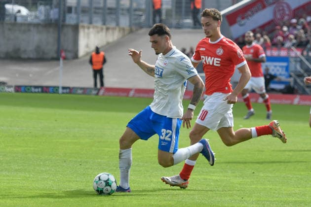From left: Niklas Kölle (Rostock 32) and Marvin Obuz (Essen 10) in a one-on-one battle, September 20, 2009, 2026 ¢ Soccer ¢ Rot-Weiss Essen vs. Hansa Rostock, Essen Stadium, Essen, DFB DFL regulations prohibit any use of photographs as image sequences and or quasi-video NRW Germany Copyright: xpepphotox xSaschaxWeizx pep00321, pep_20260920_hm