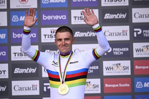 Winner Belgian Remco Evenepoel pictured wearing the world champion jersey on the podium of the men s elite individual time trial race (39,2km) at the cycling UCI Road World Championship, WM, Weltmeisterschaft in Montreal, Canada, Sunday 20 September 2026. JASPERxJACOBS  x187203954x